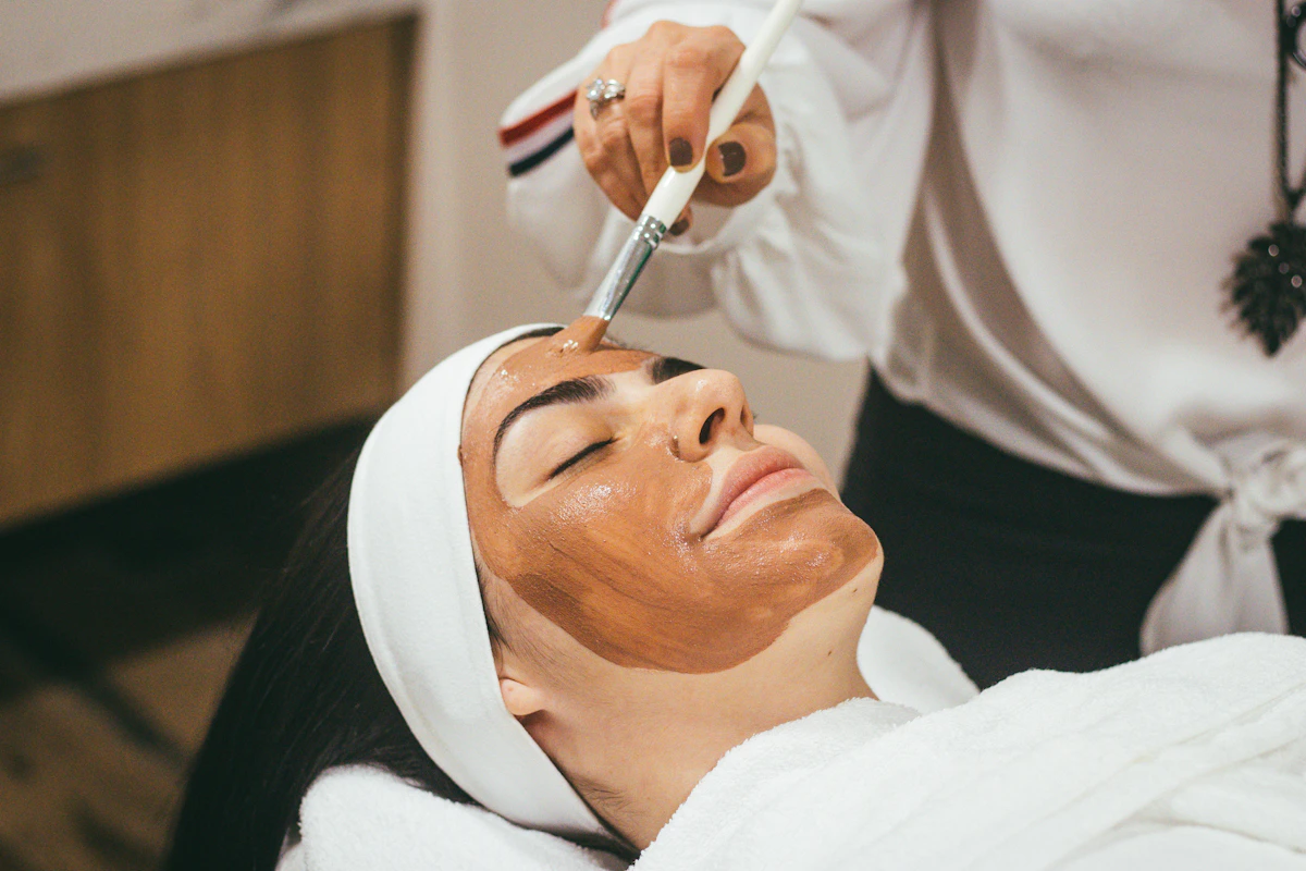 Professional skincare treatment with serums and tools