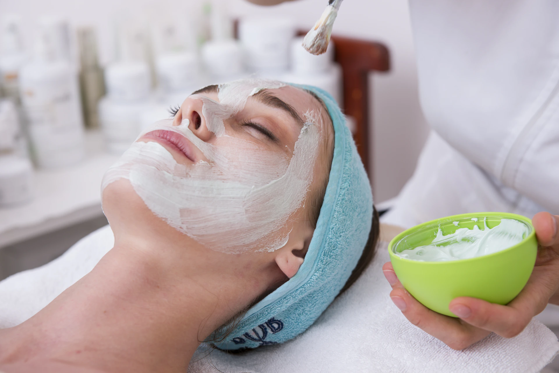 Premium hyaluronic acid serum application during AUREA facial