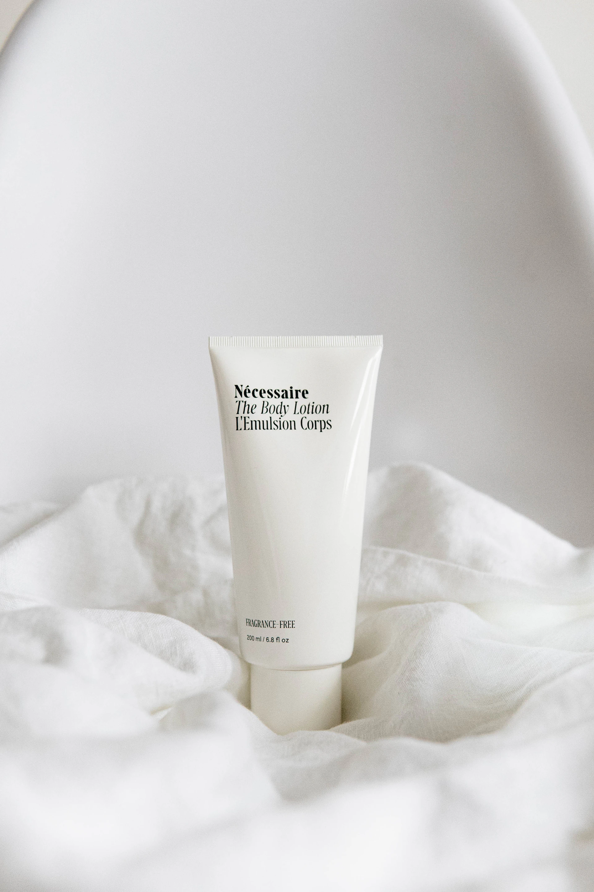 Luxury skincare products arranged on a marble surface